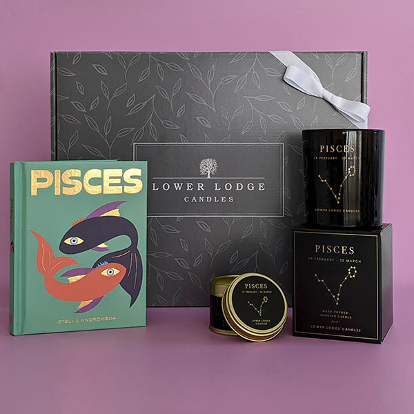 Pisces Zodiac Birthday Gift from Lower Lodge Candles. Includes a Pisces Zodiac Candle, Pisces Zodiac Tin Candle and Pisces Book by Stella Andromeda.