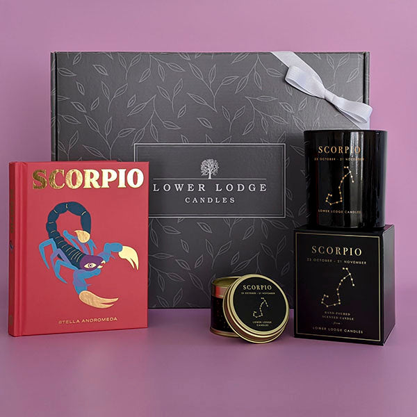 Scorpio Birthday Gift Box from Lower Lodge Candles. Featuring a Scorpio Zodiac Candle, matching Scorpio Zodiac Tin Candle and Scorpio book by Stella Andromeda. 