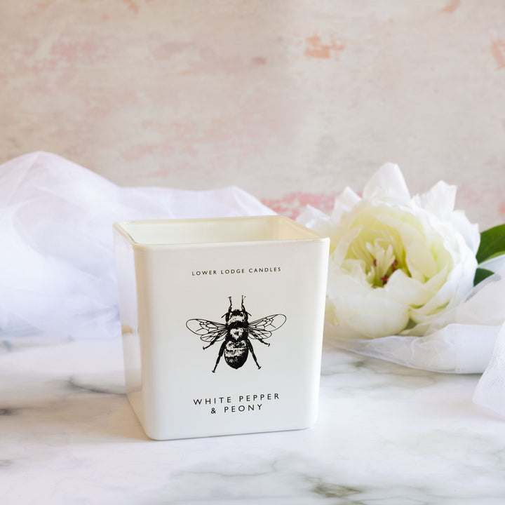 His & Hers White Pepper & Peony Deluxe Scented Candle from Lower Lodge Candles.